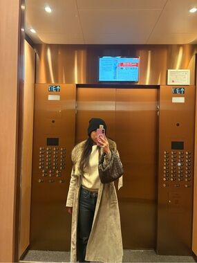 Suede trench coat with fur trim